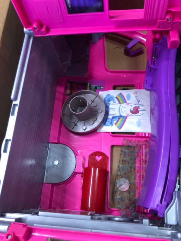 Photo 3 of Barbie Camper Playset, Dreamcamper Toy Vehicle with 60 Accessories Including Furniture, Pool and 30-Inch Slide