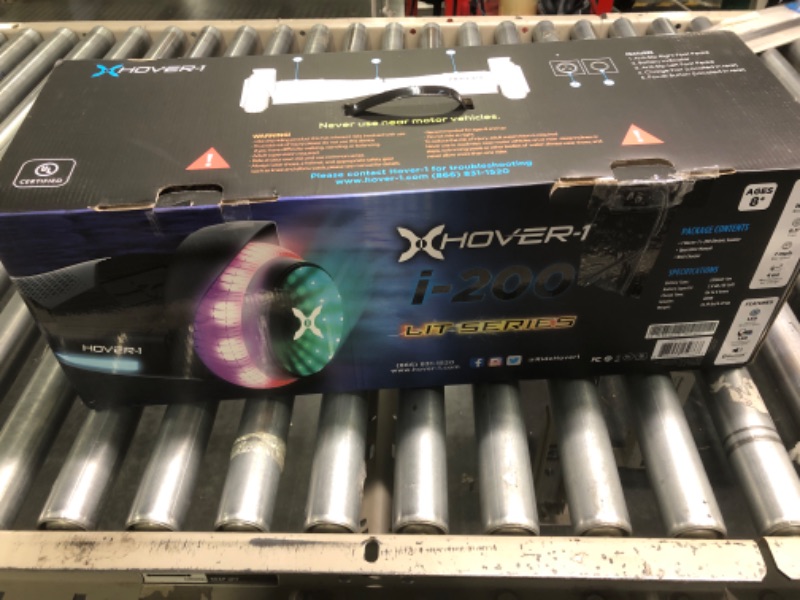 Photo 2 of Hover-1 i-200 Electric Hoverboard | 7MPH Top Speed, 6 Mile Range, 6HR Full-Charge, Built-In Bluetooth Speaker, Rider Modes: Beginner to Expert Black