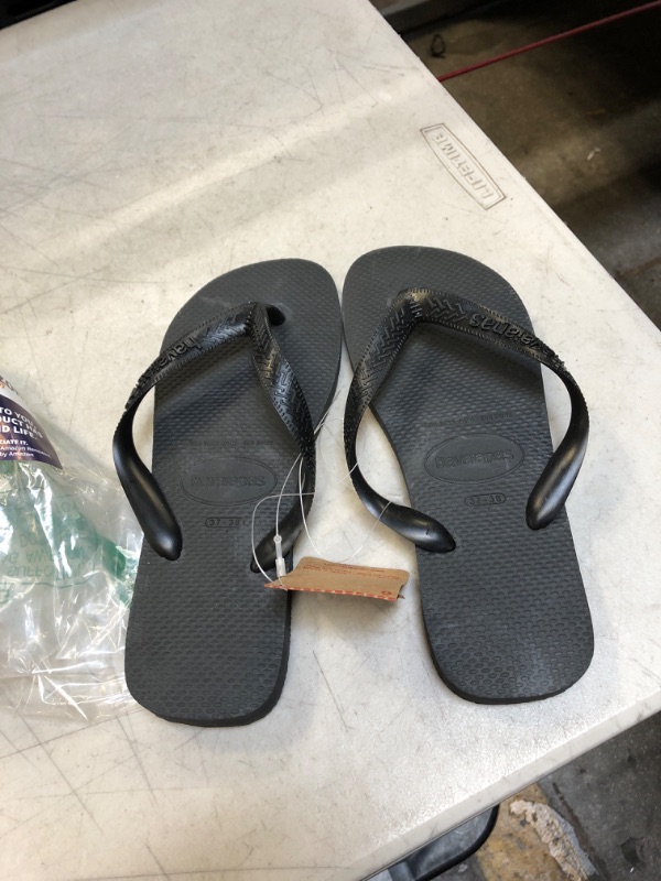 Photo 1 of BLACK HAVAIANAS SANDALS ( SIZE: 6/7) 