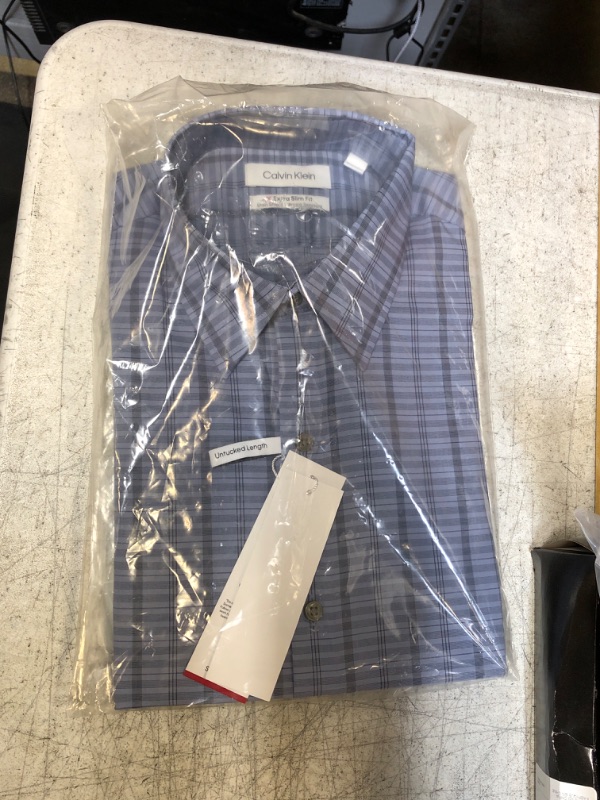 Photo 2 of Calvin Klein Men's Stain Shield Extra Slim Fit Stretch Untucked Dress Shirt
