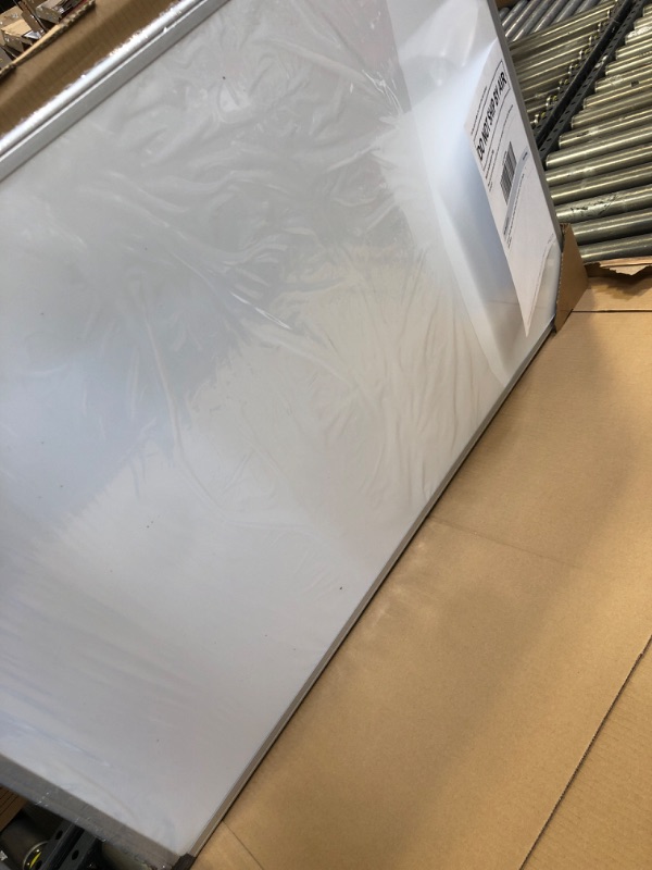 Photo 1 of Amazon Basics Magnetic Dry Erase White Board, 36 x 24-Inch Whiteboard - Silver Aluminum Frame 24" x 36" Magnetic, Aluminum Frame