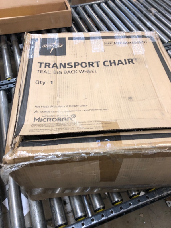 Photo 1 of Medline Transport Wheelchair with Lightweight Steel Frame, Folding Chair is Portable, Large 12 inch Back Wheels, 19 inch Wide Seat, Teal