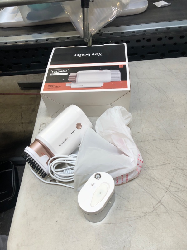 Photo 1 of HANDHELD GARMENT STEAMER 