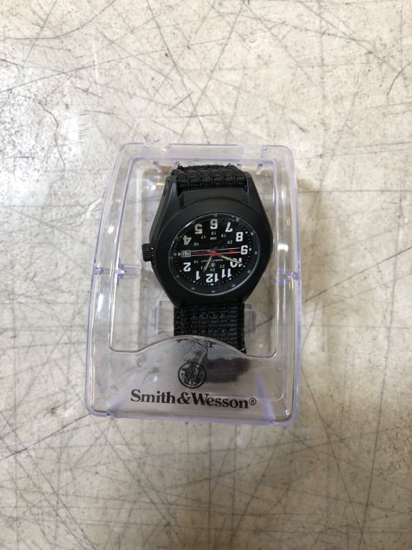 Photo 1 of Smith & Wesson Men's Tactical Watch (new, needs battery, protective peel on)
sww-w-hf12bt