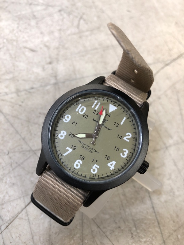 Photo 1 of Smith and Wesson Men's Nato Field Watch (SWW-W-MX31-TAN) 
 (new, needs battery, protective peel on)
