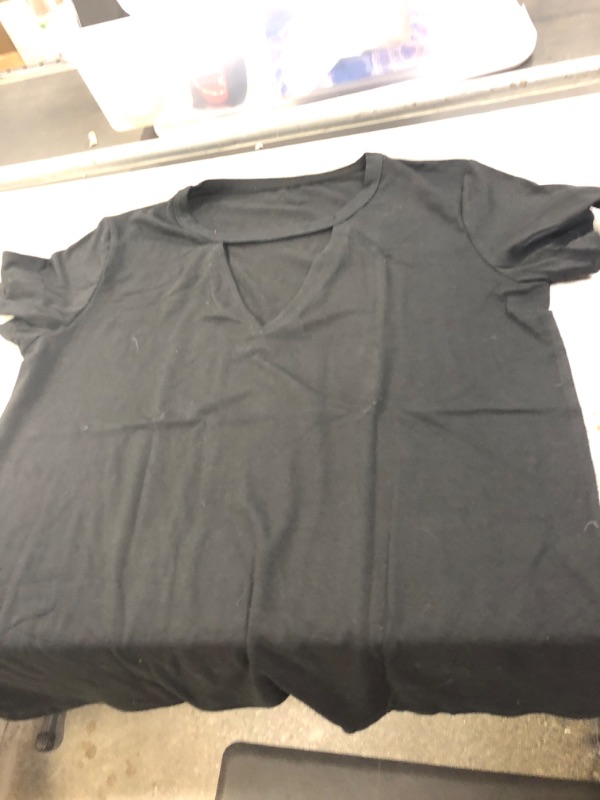 Photo 1 of Women's size large black t shirt 