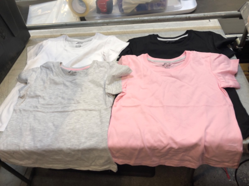 Photo 1 of 4 pack Girls size 6/7 T shirt ( various colors ) 