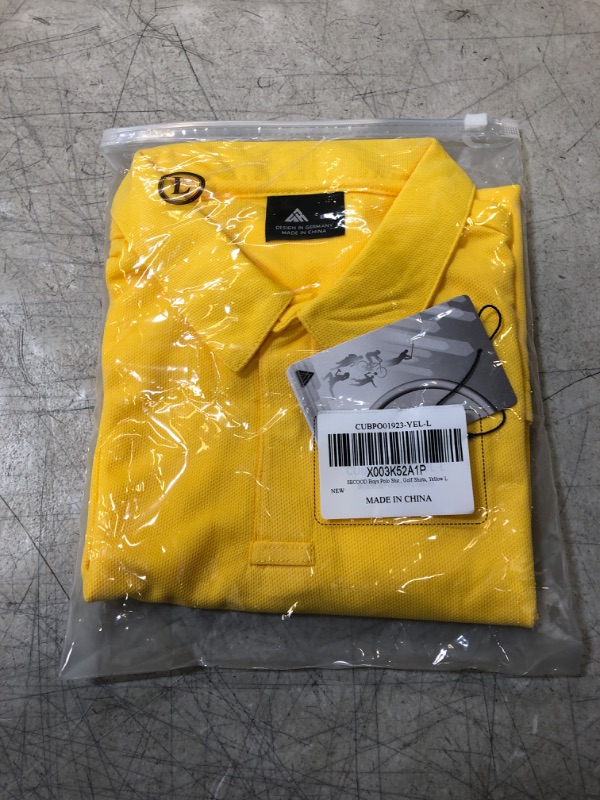 Photo 1 of BOYS POLO SHIRT
SIZE LARGE YELLOW 