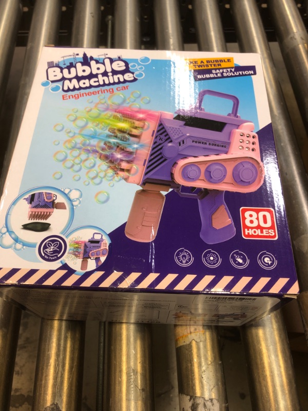Photo 2 of Bubble Gun with Light Bubble Solution Automatic 69 Holes Bubble Machine Gun Bubbles Maker Blaster Blower Toys for Kids Outdoor Indoor Birthday Wedding Party Pink