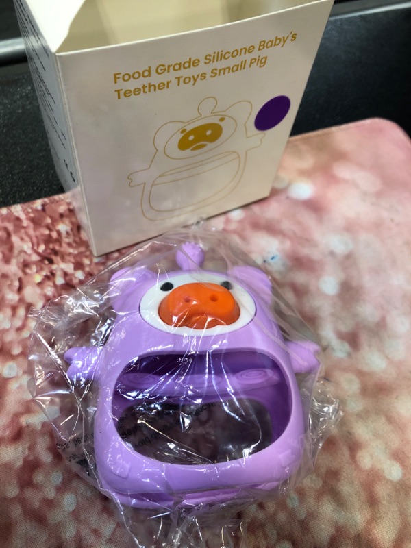 Photo 2 of 
Roll over image to zoom in
Baby Teether, Safe and Soothing Silicone Baby Teething Toys for 0-6 Months, Baby Chew Toys for Sucking Needs, BPA Free (Purple)