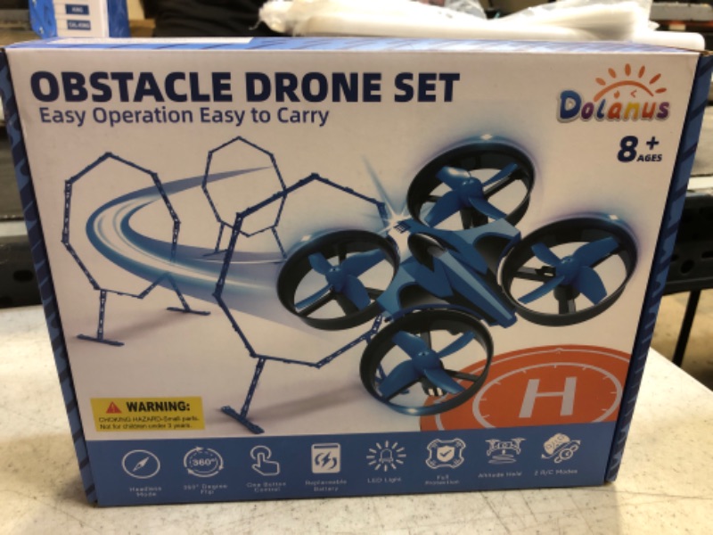 Photo 2 of Dolanus Mini Drone for Kids Beginner - Fun Fly Racing Games, More Accessories RC Indoor Small UFO with Multiple Modes and 2 Batteries, Propeller Remote Control Quadcopter Helicopter for Boys, Blue, 8+