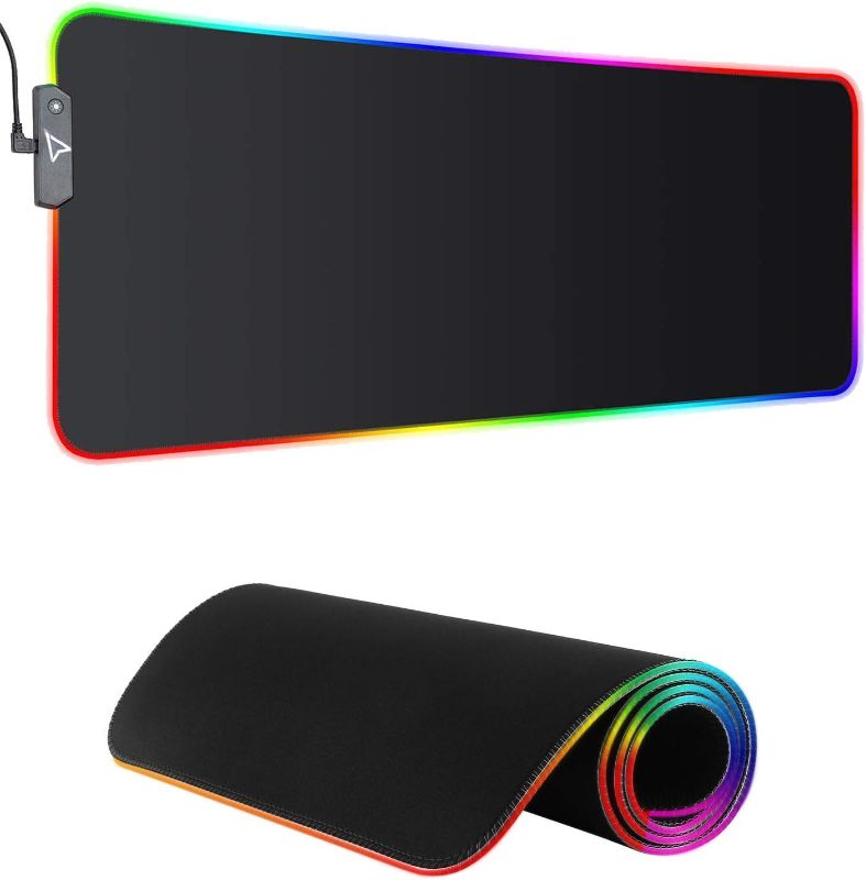 Photo 1 of Extra Large Gaming Mouse pad , RGB Mouse Pad with 15 Lighting Mods Soft Long Mousepad , Non-Slip Rubber Base , Waterproof , Low Friction Micro-Weave Surface Keyboard Pad Mat for Gaming - 31.5×11.8
