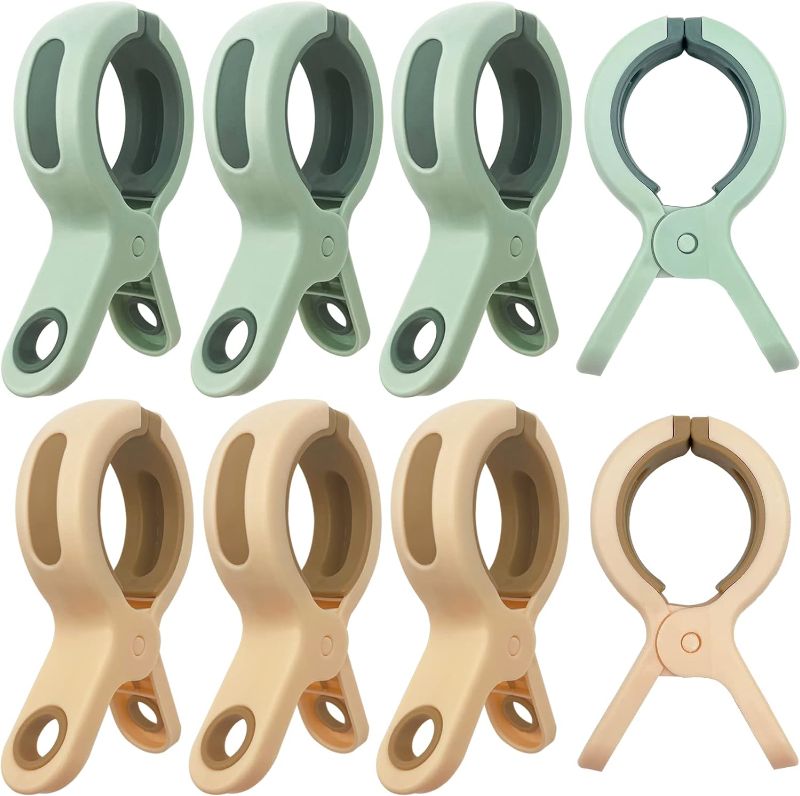 Photo 1 of 8 Pack Beach Towel Clips for Beach Chairs Cruise, Beach Chair Clips for Towels Lounge Chairs Pool Towel Holder, Large Clips Plastic Clothespin Clamps for Hanging Clothes in Bright Color(Orange, Green)
