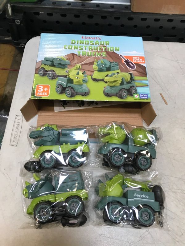 Photo 2 of Kidtastic Dinosaur Construction Trucks Toys for Ages 3-6 Kids 4 Pack, Baby Boys Girls STEM Learning Toys, Toddlers, Dump Truck Toy, Screwdrivers Included
