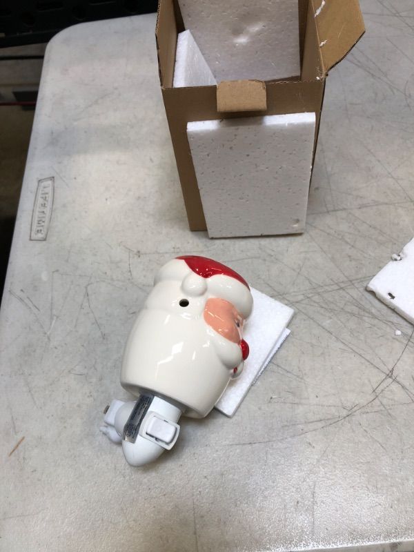 Photo 1 of CERAMIC SANTA CLAUSE PLUG IN 