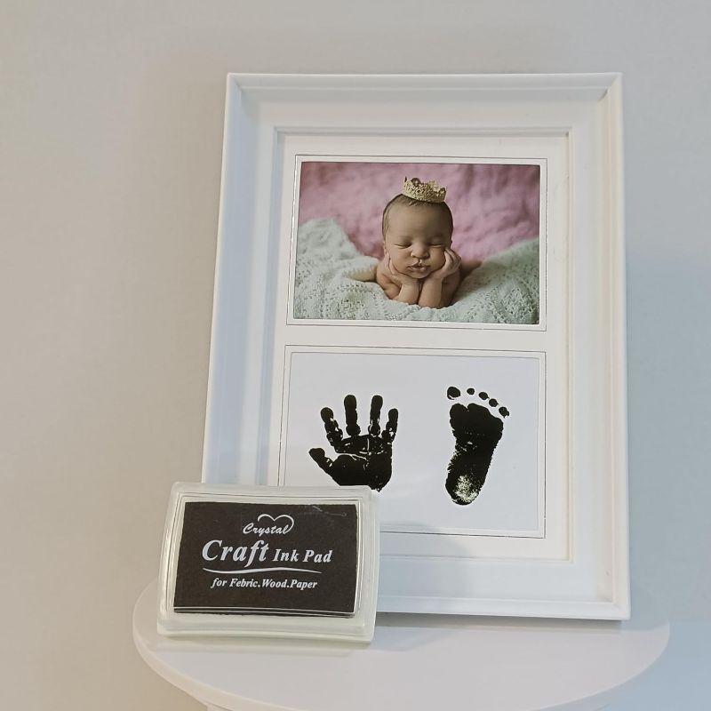 Photo 1 of  9x7 Baby Picture Frames Handprint and Footprint Kit. Photo Frame for Newborn. Opening 4.7x3.1 inch. White.