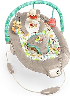 Photo 1 of Bright Starts Disney Baby Winnie the Pooh Baby Bouncer Soothing Vibrations Deluxe Infant Seat - Faux Suede, Music, Removable -Toy Bar, 0-6 Months 6-20 lbs (Dots & Hunny Pots)
