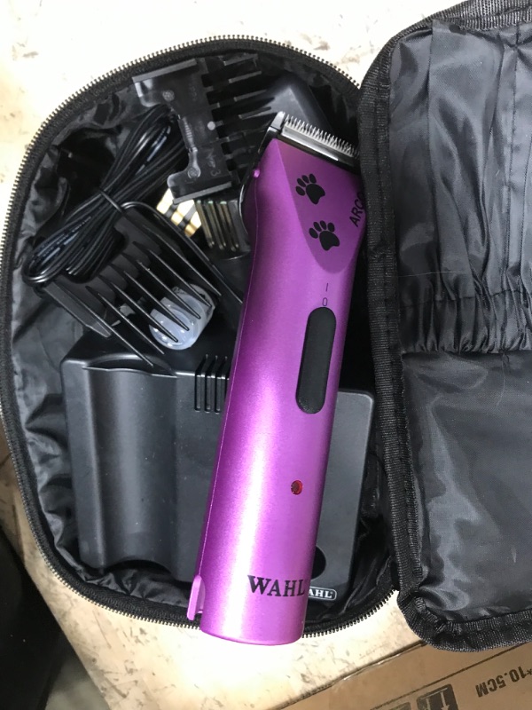 Photo 3 of **BATTERY CHARGER, BATTERY, AND CLIPPERS TESTED AND FUCNTIONAL**
WAHL Professional Animal Arco Pet, Dog, Cat, and Horse Cordless Clipper Kit, Purple (8786-1001)
