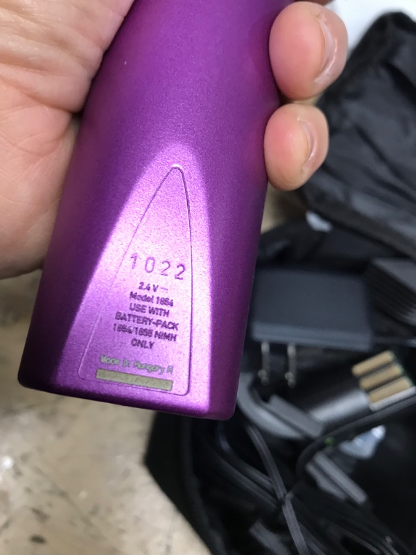 Photo 1 of **BATTERY CHARGER, BATTERY, AND CLIPPERS TESTED AND FUCNTIONAL**
WAHL Professional Animal Arco Pet, Dog, Cat, and Horse Cordless Clipper Kit, Purple (8786-1001)

