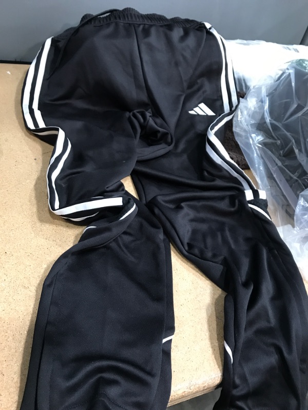 Photo 1 of Adidas adults pants (M)