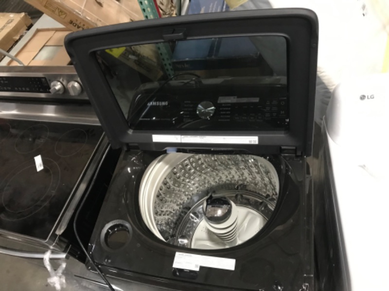 Photo 1 of Samsung 4.6-cu ft High Efficiency Agitator Smart Top-Load Washer (Brushed Black)