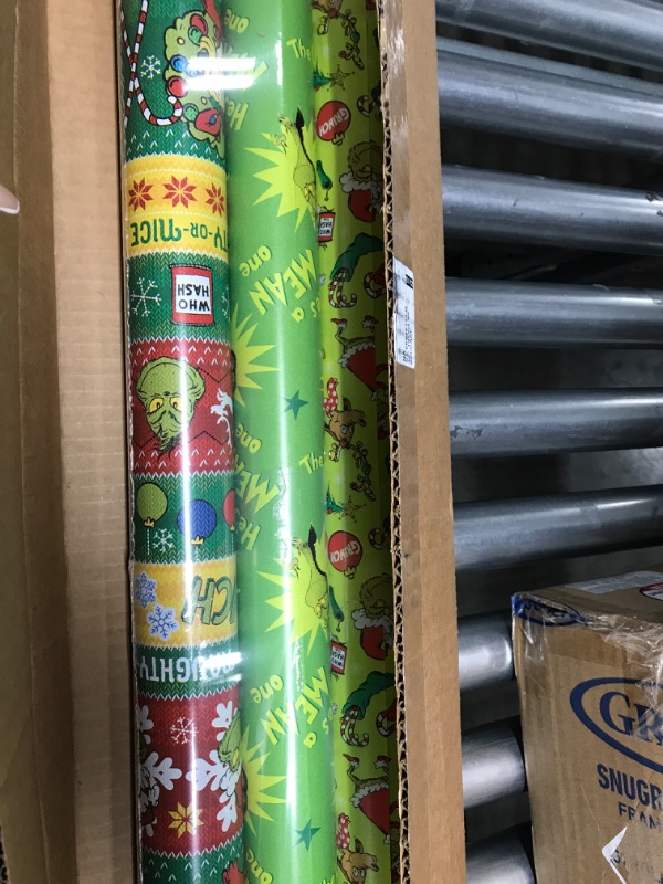 Photo 2 of American Greetings Christmas Wrapping Paper with Cut Lines Bundle, The Grinch (3 Rolls, 105 sq. ft.)