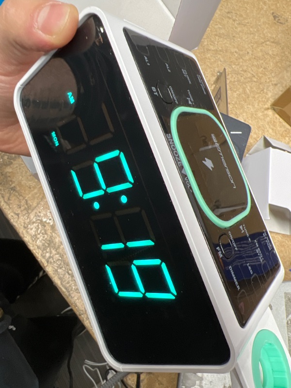 Photo 1 of Emerson Radio Smartset Alarm Clock FM Radio with Wireless Charging, Bluetooth Speaker, Fast Charging for Airpods/iPhone, Foldable Stand, USB Charger, Adjustable LED Glow, ER100501, Black/Neon ER100501 Charger