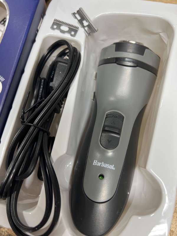 Photo 2 of **SEE NOTE*** Xtreme Digital Lifestyle Accessories Barbasol Rechargeable Electric Rotary Shaver with Stainless Steel Blades and Pop Up Trimmer