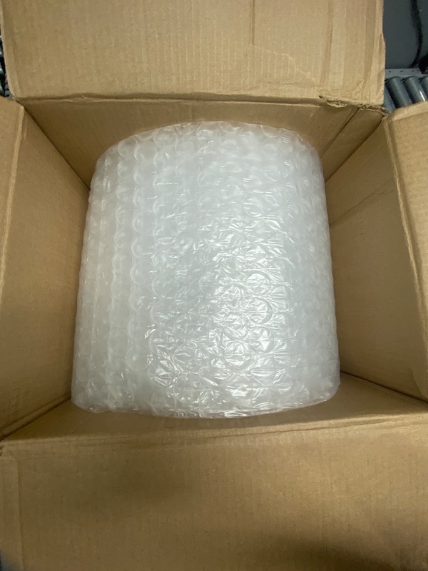 Photo 2 of Duck Brand Large Bubble Wrap Cushioning, 5/16" Bubbles for Extra Protection Packing, Shipping, and Moving, Perforated Every 12", 12" x 60' per Roll 12 in. x 60 ft.