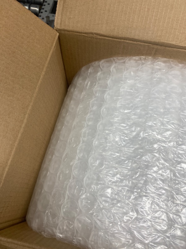 Photo 3 of Duck Brand Large Bubble Wrap Cushioning, 5/16" Bubbles for Extra Protection Packing, Shipping, and Moving, Perforated Every 12", 12" x 60' per Roll 12 in. x 60 ft.