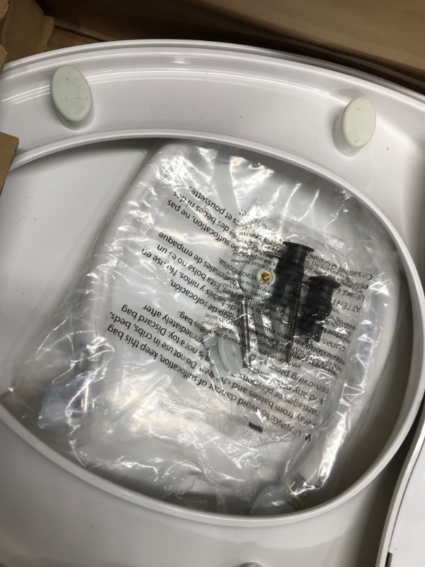 Photo 2 of **MISSING VALVE**
American Standard 5900A05G.020 Aqua Wash Non-Electric Bidet Seat 