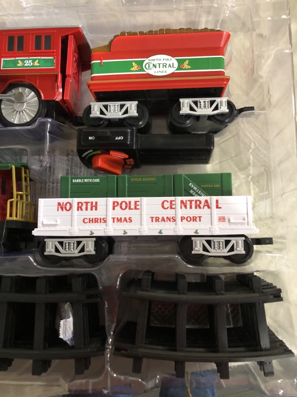 Photo 7 of ***PARTS ONLY/NON-RETURNABLE**ENGINE BACK IS BROKEN**ENGINE HITCH IS BROKEN***
Lionel North Pole Central Battery-Powered Train Set with Remote + Inner Loop Track Expansion Pack Complete Set + Expansion Track (Inner Loop)