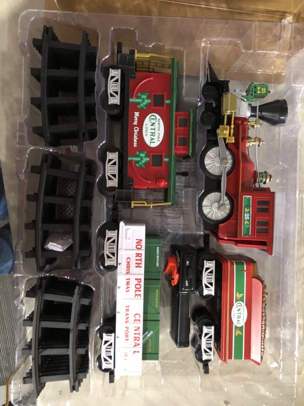 Photo 5 of ***PARTS ONLY/NON-RETURNABLE**ENGINE BACK IS BROKEN**ENGINE HITCH IS BROKEN***
Lionel North Pole Central Battery-Powered Train Set with Remote + Inner Loop Track Expansion Pack Complete Set + Expansion Track (Inner Loop)