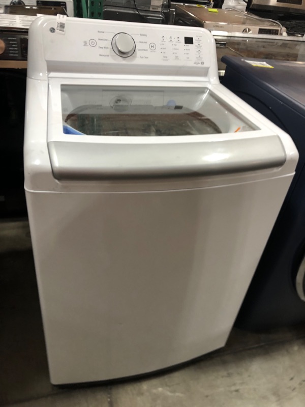 Photo 4 of LG 4.8-cu ft High Efficiency Agitator Top-Load Washer (White) ENERGY STAR
