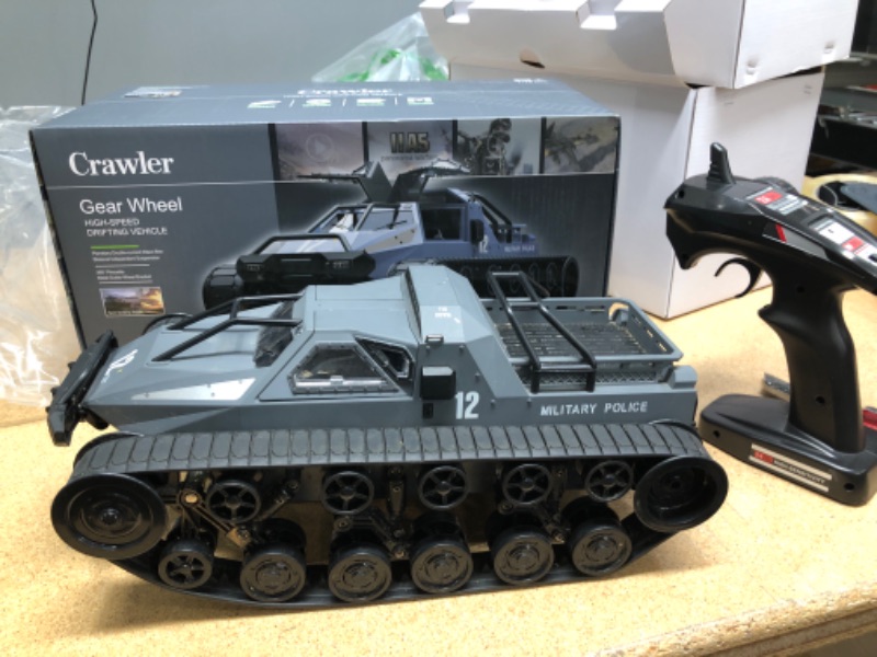 Photo 2 of * See notes* Remote Control Crawler, 1:12 Scale Off-Road Tank, 2.4Ghz Radio RC Car, 4WD High Speed All Terrain RC Truck for Kids & Adult(Black)
