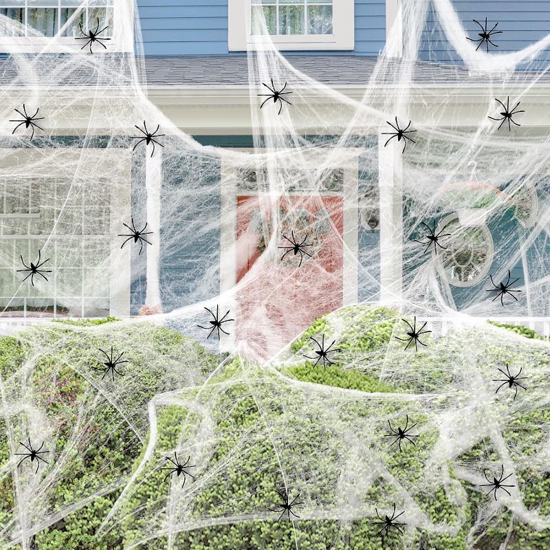 Photo 1 of 1200 sqft Spider Webs Halloween Decorations with 100 Fake Spiders,Super Stretchy Cobwebs for Halloween Decorations Indoor,Fake Spider Web for Halloween Party Decorations,Scary Outdoor Halloween Decor
