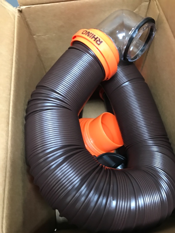 Photo 2 of Camco RhinoFLEX RV Sewer Hose Kit with Swivel Transparent Elbow and 4-in-1 Dump Station Fitting, Brown, 15 Feet (39770) 15ft Sewer Hose Kit Frustration-Free Packaging