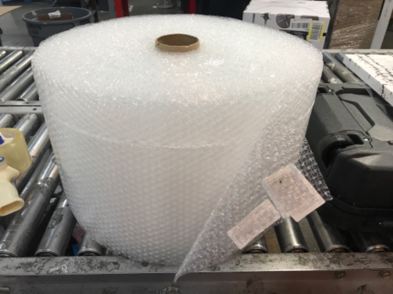 Photo 2 of Amazon Basics Perforated Bubble Cushioning Wrap - Small 3/16", 12-Inch x 175-Foot Long Roll 