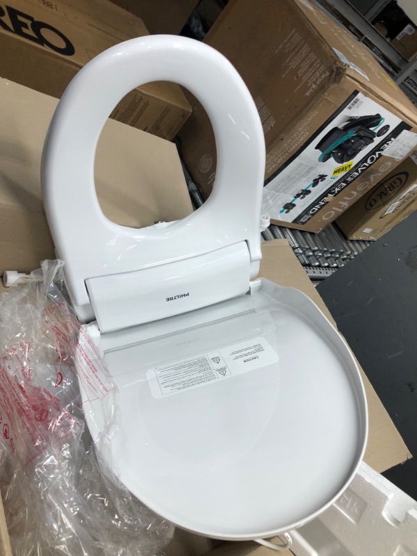 Photo 2 of ***LIGHTS UP WHEN PLUGGED IN - UNABLE TO TEST FURTHER***
PHILTRE Toilet Bidet Attachment with Heated Toilet Seat, Warm and Cold Water, Dryer, Hygienic All-Stainless Steel Nozzle