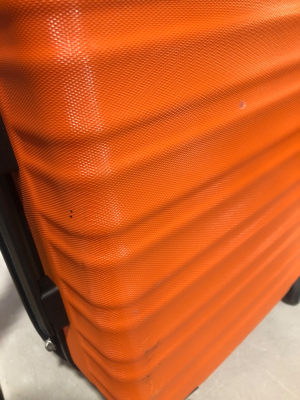 Photo 1 of * used * damaged * see images *
Amazon Basics 21-Inch Hardside Spinner, Orange Orange 21-inch Spinner