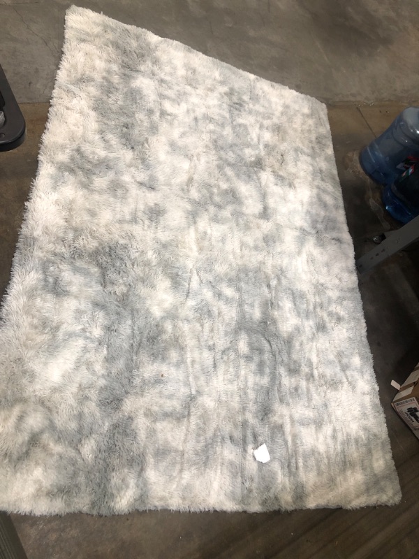 Photo 1 of 4'10"x7' white/grey fury rug 