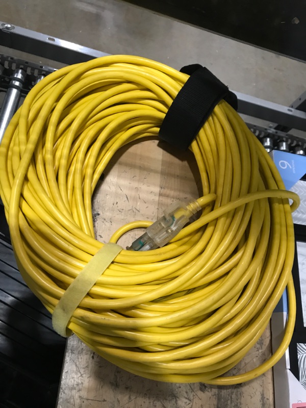 Photo 1 of 200 ft 12/3 Gauge Outdoor Extension Cord Waterproof Heavy Duty with Lighted end, Flexible Cold-Resistant 3 Prong Electric Cord Outside, 15Amp 1875W 12AWG SJTW, Yellow, ETL HUANCHAIN 200FT 12/3 Extension Cord Yellow