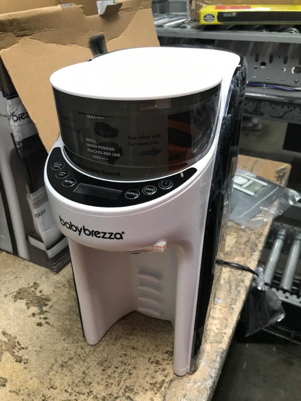 Photo 2 of New and Improved Baby Brezza Formula Pro Advanced Formula Dispenser Machine - Automatically Mix a Warm Formula Bottle Instantly - Easily Make Bottle with Automatic Powder Blending