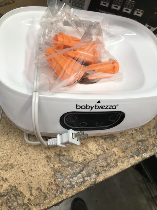 Photo 2 of Baby Brezza Baby Bottle Sterilizer and Dryer Advanced – Electric Steam Sterilization Machine – Universal Sterilizing for All Bottles: Plastic + Glass + Pacifiers + Breast Pump Parts - HEPA Filtration