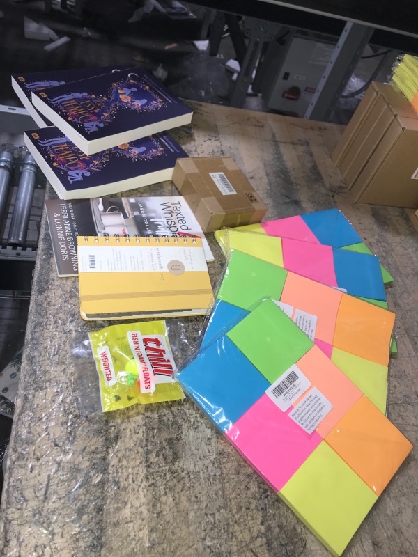 Photo 1 of 11PC MISC GOODS BUNDLE of Portuguese & English Books, Colorful Sticky Note Pads (2400), Fishing Lure, Planner Booklet (2022) & Spare Drone Batteries (SEE NOTES)