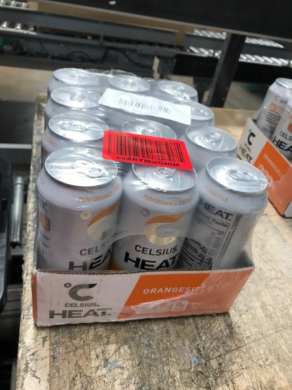 Photo 1 of **EXP DATE 07/2023**CELSIUS HEAT Orangesicle Performance Energy Drink, Zero Sugar, 16oz. Can (Pack of 12)