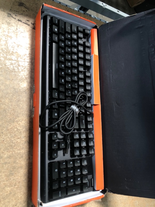 Photo 2 of SteelSeries Apex 3 TKL RGB Gaming Keyboard – Tenkeyless Compact Form Factor - 8-Zone RGB Illumination – IP32 Water & Dust Resistant – Whisper Quiet Gaming Switch – Gaming Grade Anti-Ghosting,Black
