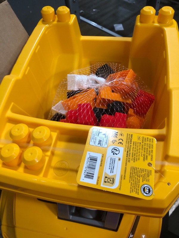 Photo 1 of Mega Bloks CAT Large Dump Truck with Big Building Blocks, Building Toys for Toddlers (25 Pieces) [Styles May Vary] , Yellow