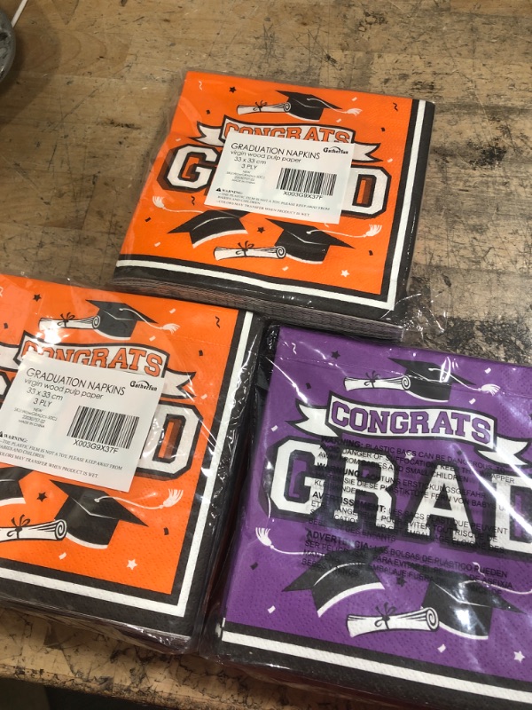 Photo 1 of BUNDLE OF 3 GRADUATION NAPKIN PACKS (PUPLE AND ORANGE)