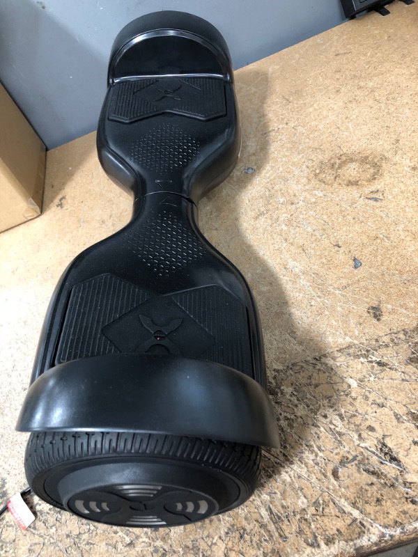 Photo 2 of ***FOR PARTS ONLY *** 
Hover-1 Helix Electric Hoverboard | 7MPH Top Speed, 4 Mile Range, 6HR Full-Charge, Built-in Bluetooth Speaker, Rider Modes: Beginner to Expert Hoverboard Black